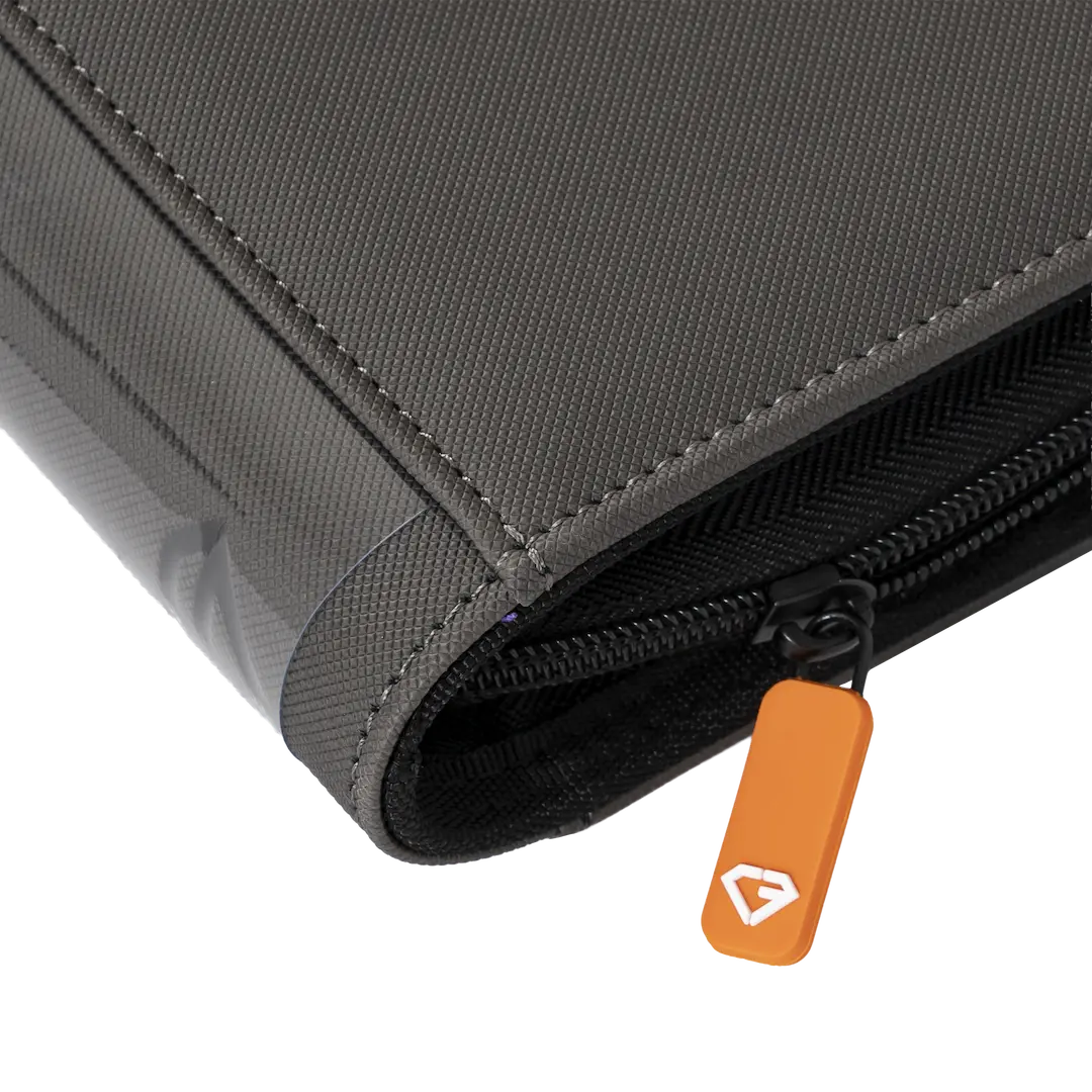 4-Pocket Toploader Card Binder Grey zippered pocket and quality fabric detail for card storage.
