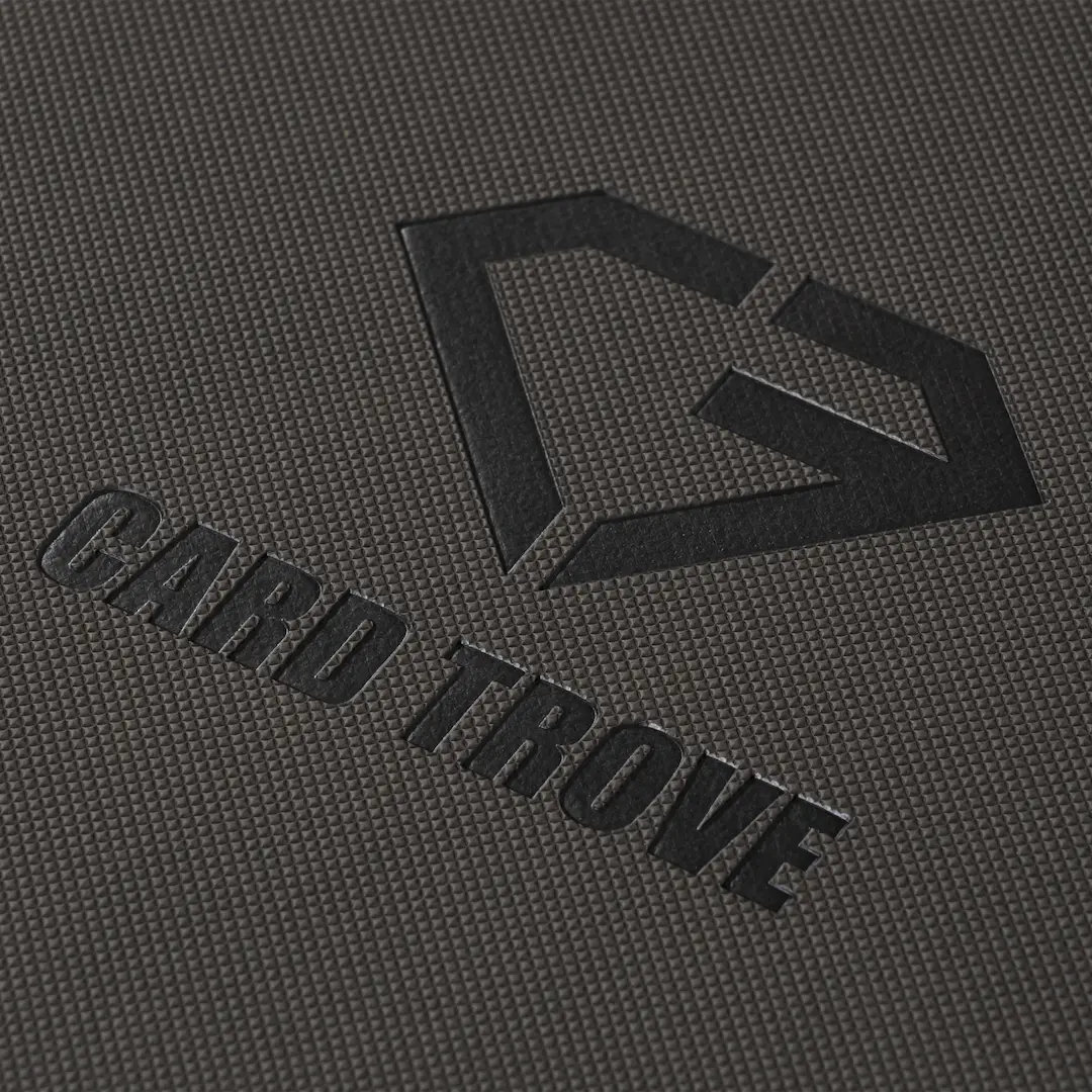 4-Pocket Card Binder Grey close-up showing premium texture and logo on the cover.
