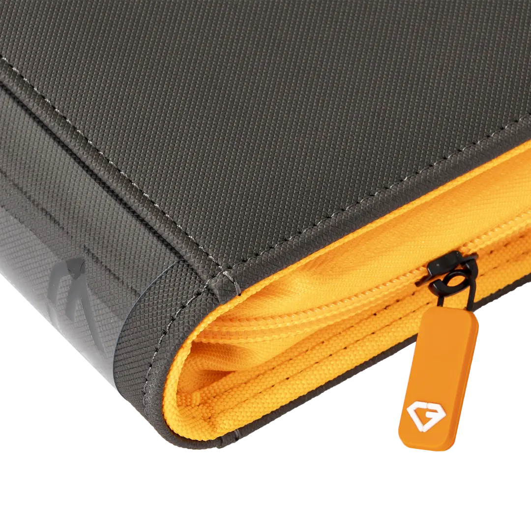 9-Pocket Toploader Card Binder - Trove Limited zipper detail and grey cover with yellow accents.