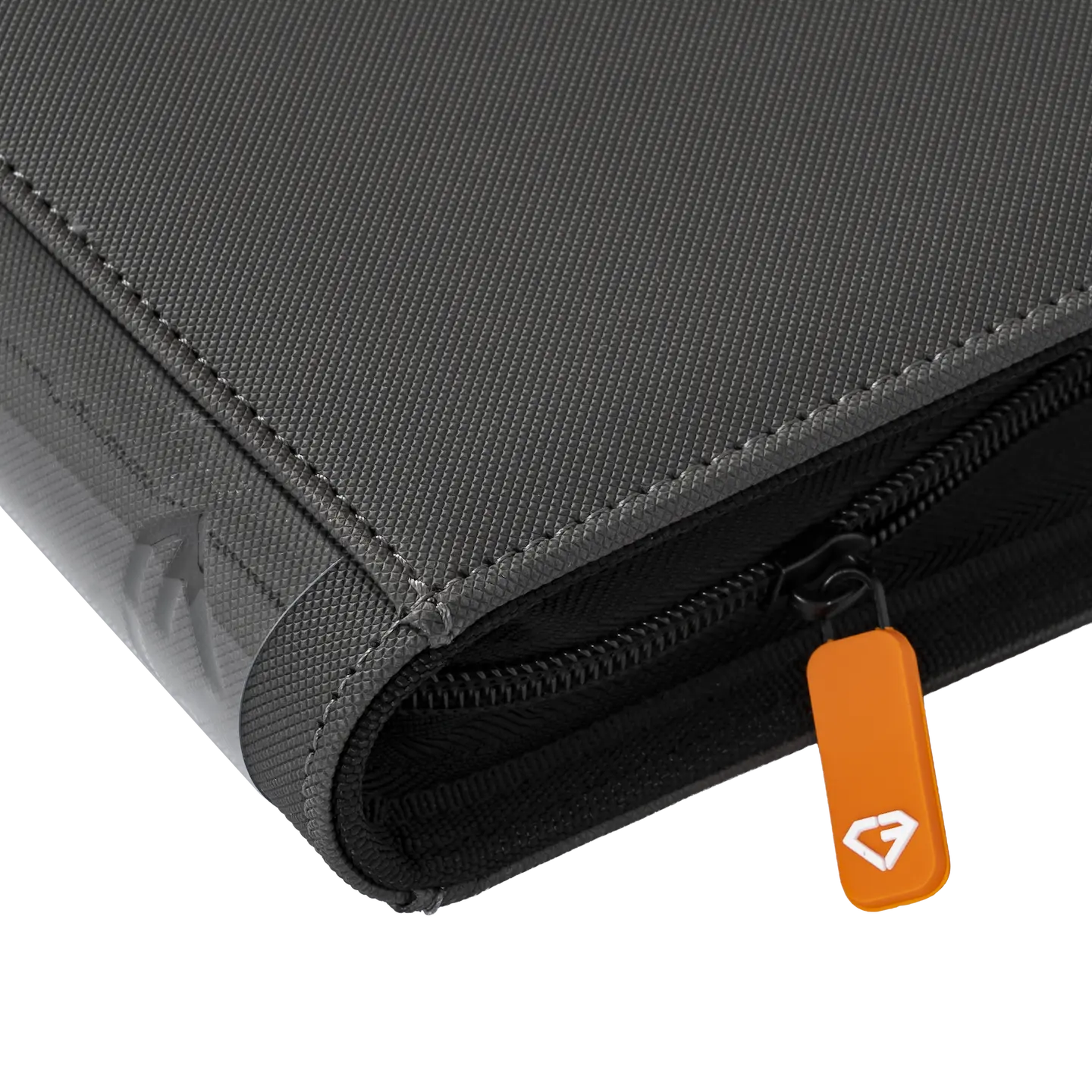 Close-up of the 9 Pocket Card Binder in gray with a smooth zipper and orange pull tab.