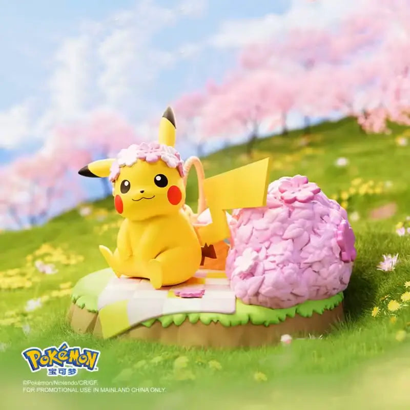 Pikachu Pokémon Nature Figure surrounded by cherry blossoms, showcasing a cute and vibrant design.