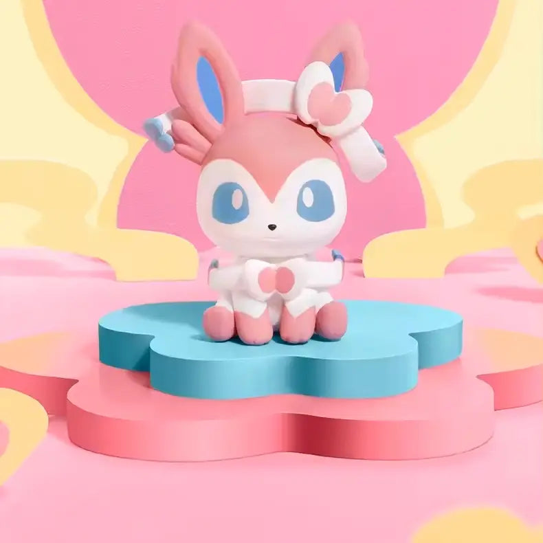 Eeveelution Mini Figure Blind Box featuring a cute Sylveon figure on a colorful flower base.