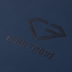 Close-up of the 12-Pocket Card Binder Blue featuring the Card Trove logo on a textured blue surface.