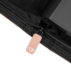 Close-up of the zipper pull on the 4-Pocket Toploader Card Binder Pink for secure card storage.