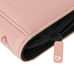 Close-up of the zipper and texture of the 4-Pocket Toploader Card Binder Pink in a sturdy design.