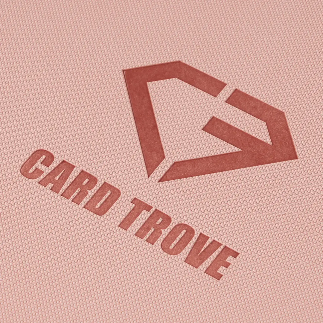 4-Pocket Toploader Card Binder Pink logo detail with card trove design on a pink textured surface.