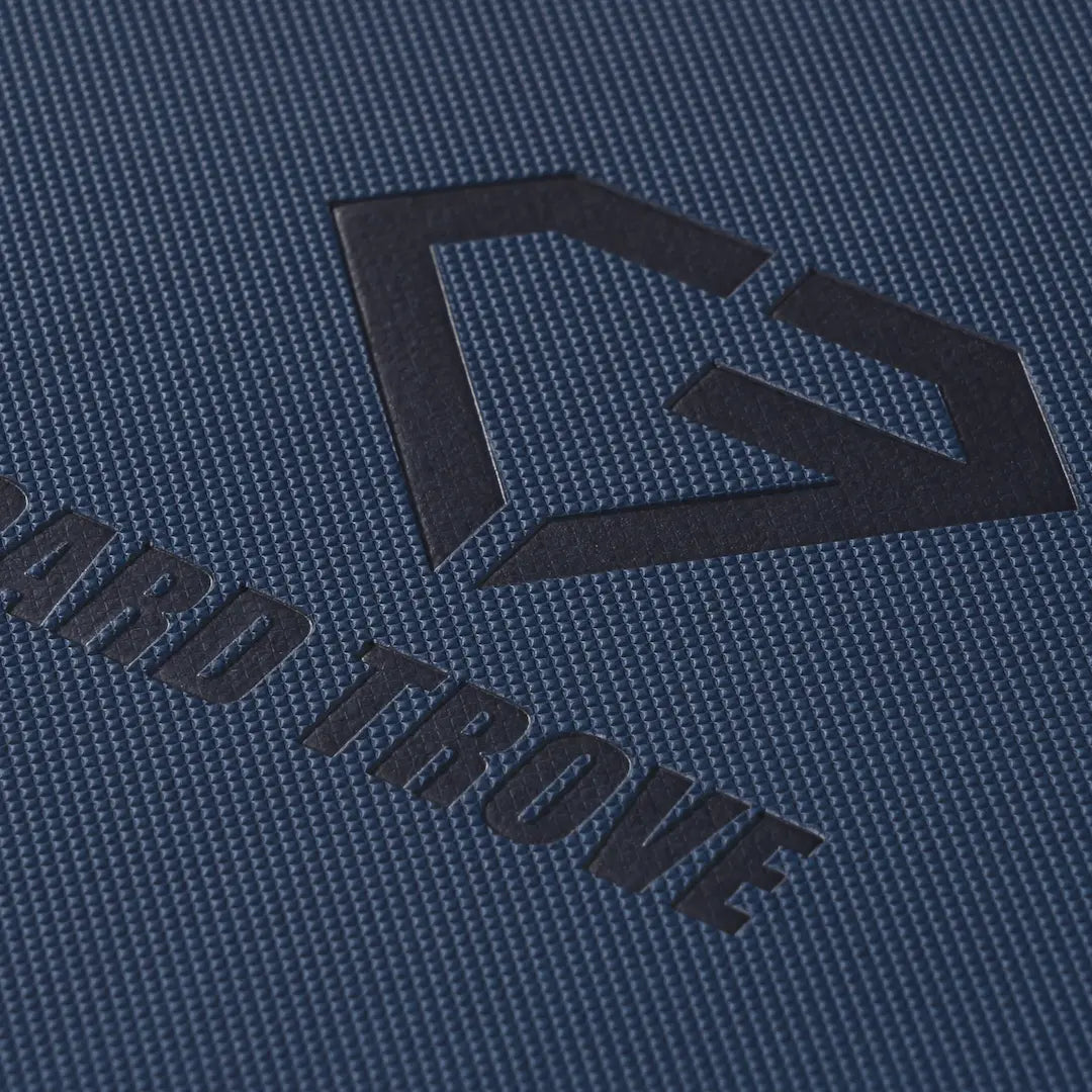 4-Pocket Card Binder Blue close-up with logo detail on premium textured surface.