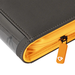 9-Pocket Toploader Card Binder - Trove Limited zipper detail and grey cover with yellow accents.