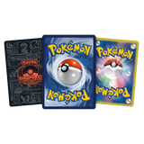 Three Pokémon trading cards featuring iconic designs, including a Poké Ball and World Championship branding.
