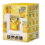 30th Celebration Pikachu Figure Blind Box featuring Pikachu and collectible trading cards for Pokémon fans.
