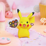 Pikachu Figure Cans featuring a cheerful Pikachu holding a heart-shaped can filled with Pokémon figures.