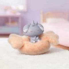 Pokémon: Poképeace Napping Figures Blind Box (Holly Box) featuring a sleeping Pokémon in a cozy basket.