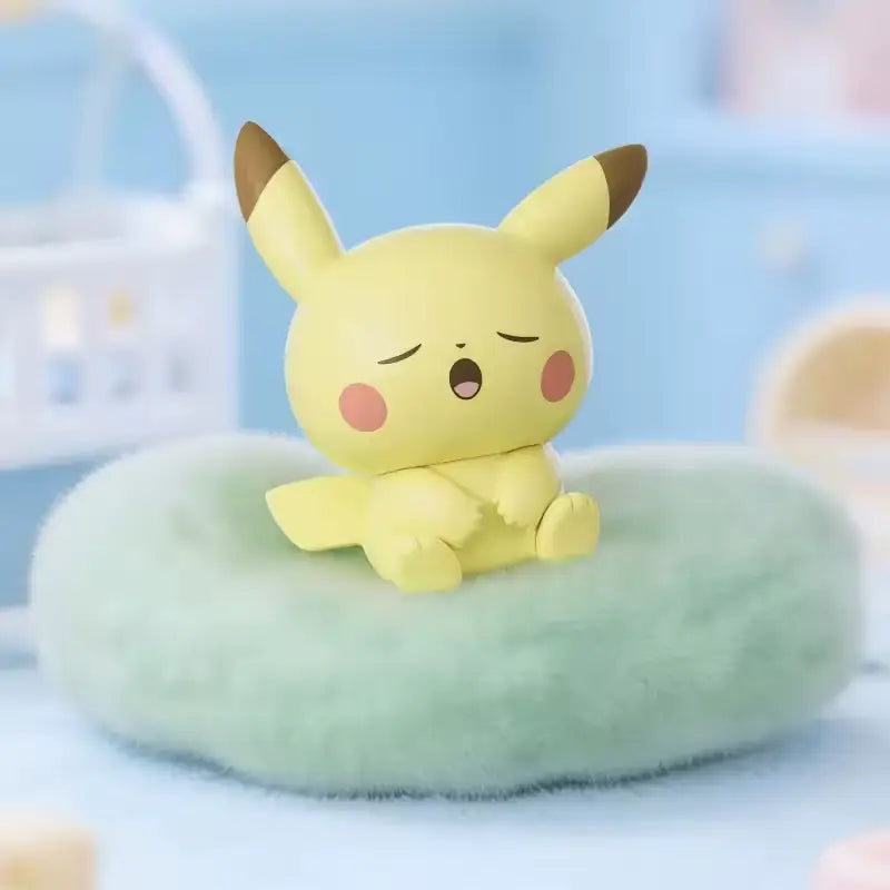 Pokémon: Poképeace Napping Figures Blind Box (Holly Box) featuring a sleeping Pikachu figure on a fluffy pillow.
