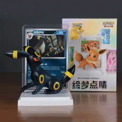 Pokémon Eeveelutions Blind Box [Live] featuring an Umbreon figure with a card display in background.