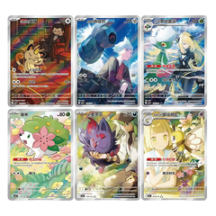 Collection of colorful Pokémon trading cards featuring various characters and scenes from the Pokémon universe.