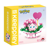 Keeppley Pokémon Bonsai 1.0 set Kanto con Jigglypuff e fiori di bonsai colorati.