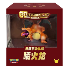 30th Anniversary Charizard collectible figure in a display box, showcasing vibrant colors and detailed design.