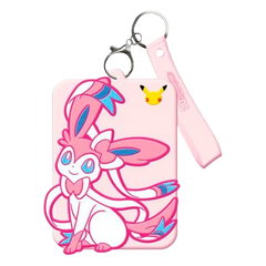 Cute Sylveon keychain with a pink design and Pikachu tag, perfect for Pokémon fans.